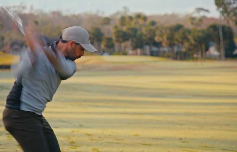 golfer preparing to swing